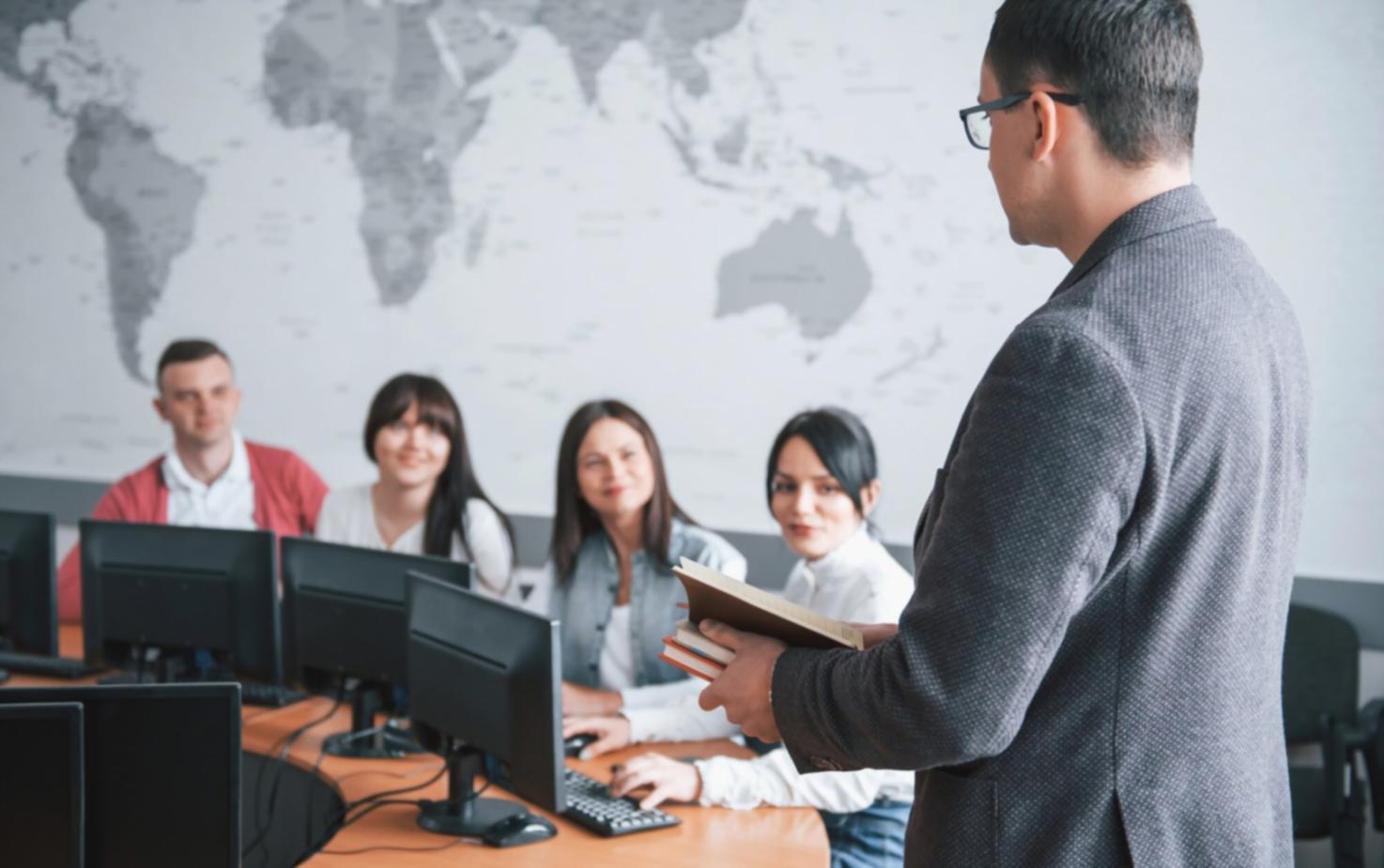 Business professionals reviewing leadership training materials